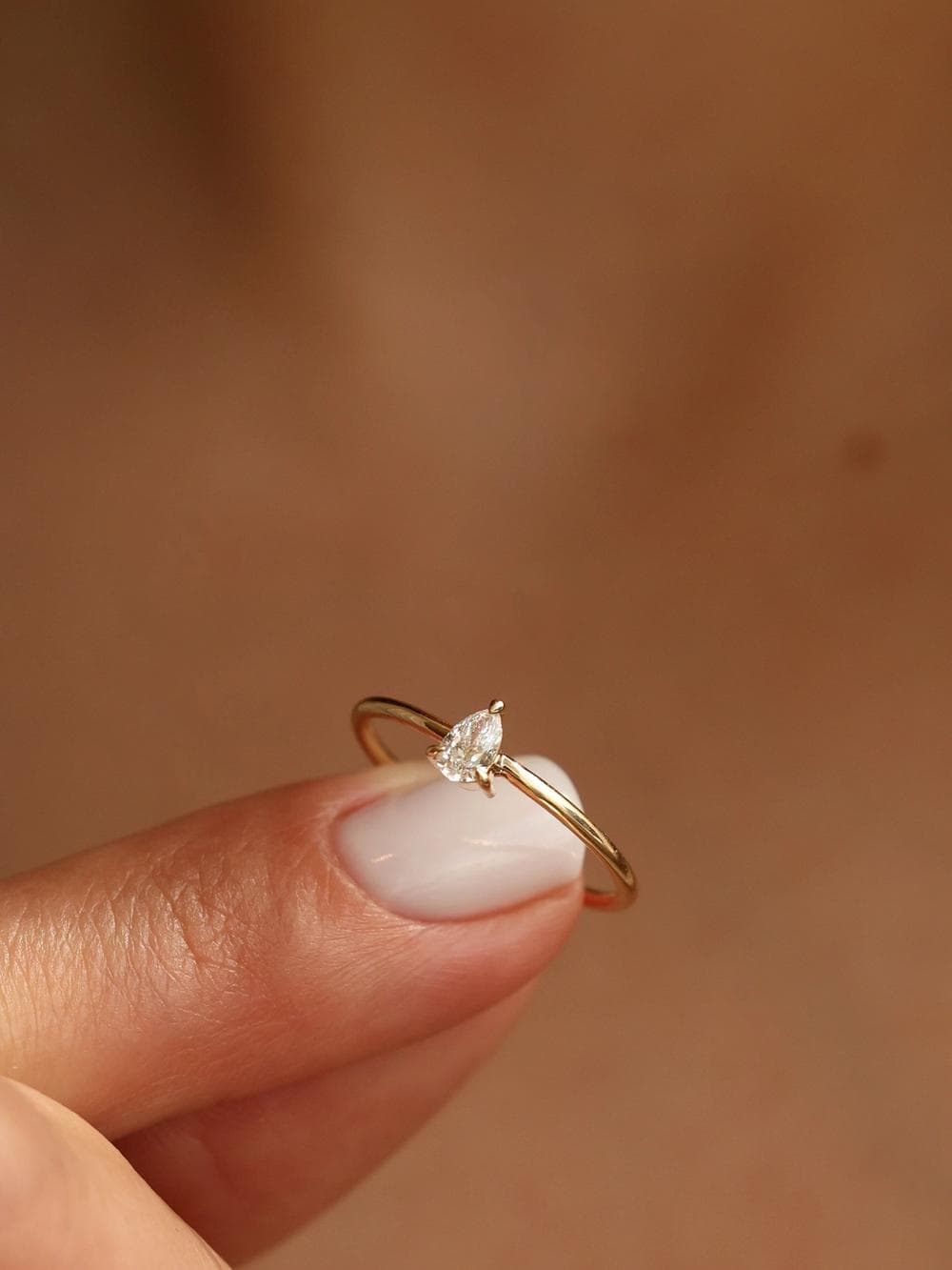 Classic Pear Cut Ring studio view v4