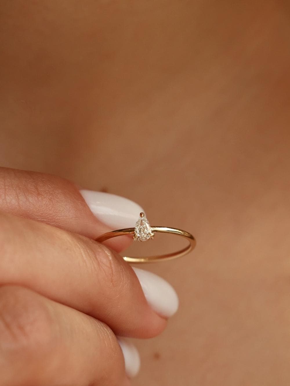 Classic Pear Cut Ring studio view