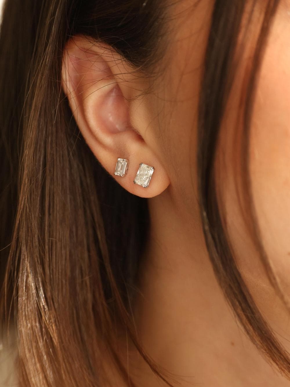 Emerald Cut Stud Earrings ear view