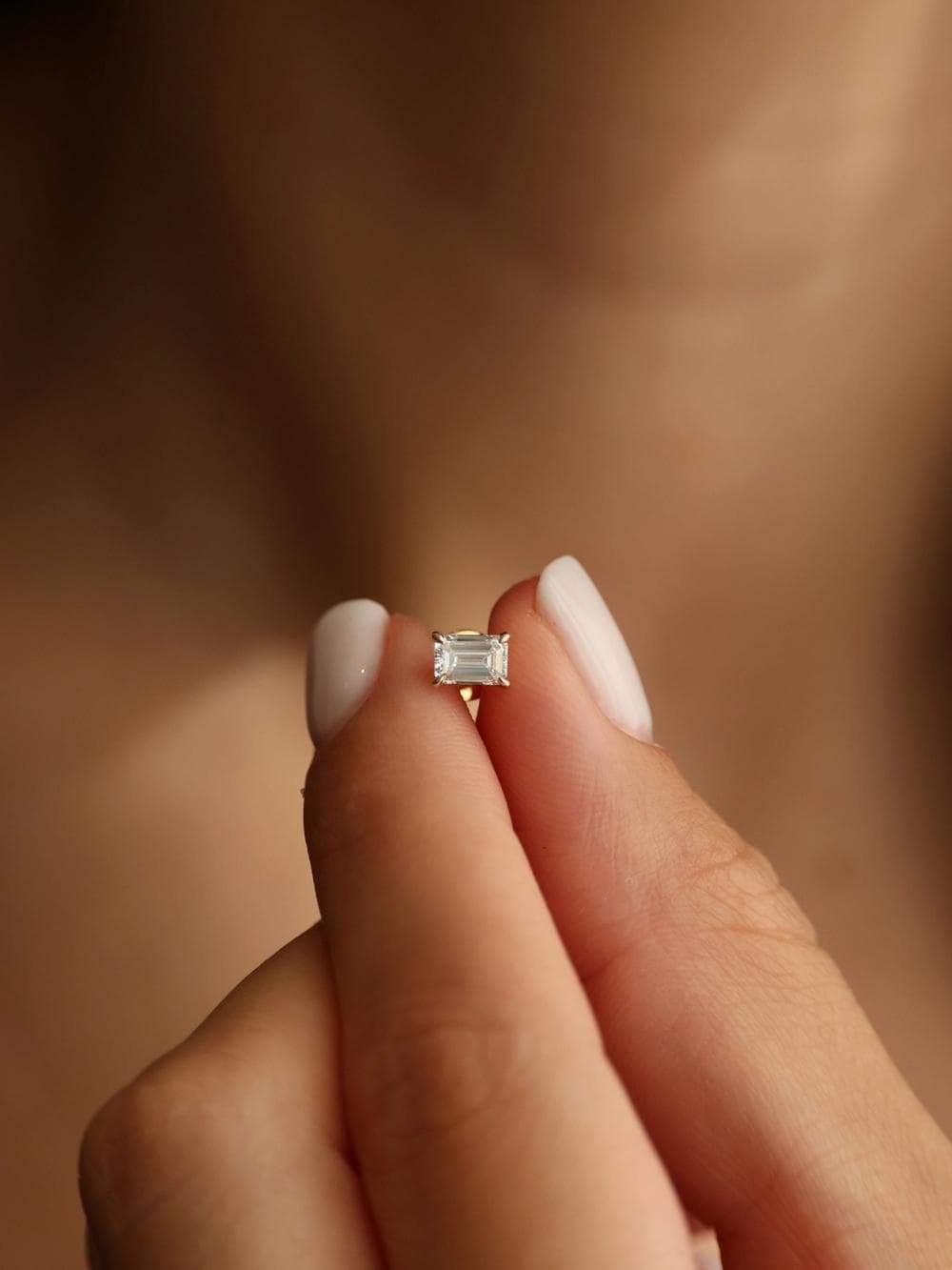 Emerald Cut Stud Earrings alternate finger detail